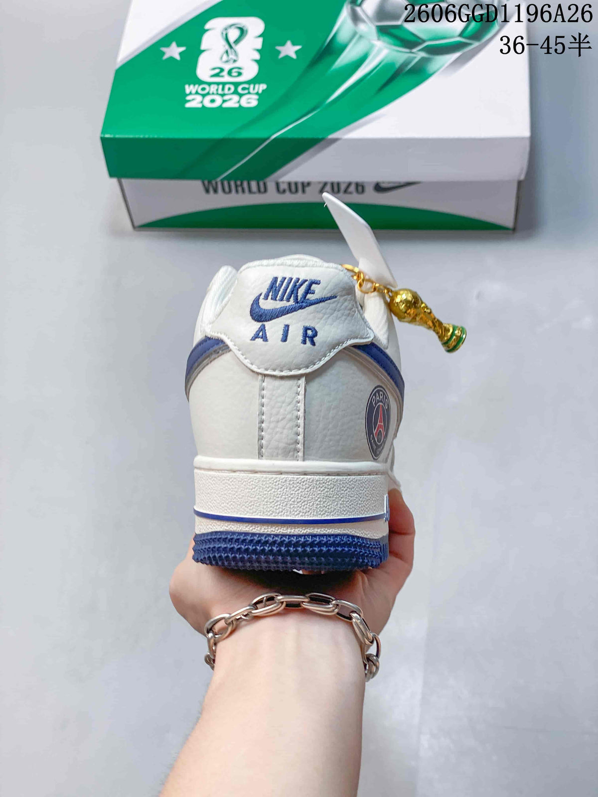 Rear view showing the Nike Air tongue label, blue trim, and Paris Saint-Germain heel crest.