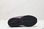 Underside view showing the black outsole with segmented panels and raised lugged tread.
