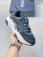 Angled side view of a black and white Dior sneaker showing the perforated side panel, mesh sections, branding, and thick sole.