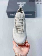 Top view showing the rounded toe, lace-up closure, tongue, and textured upper.
