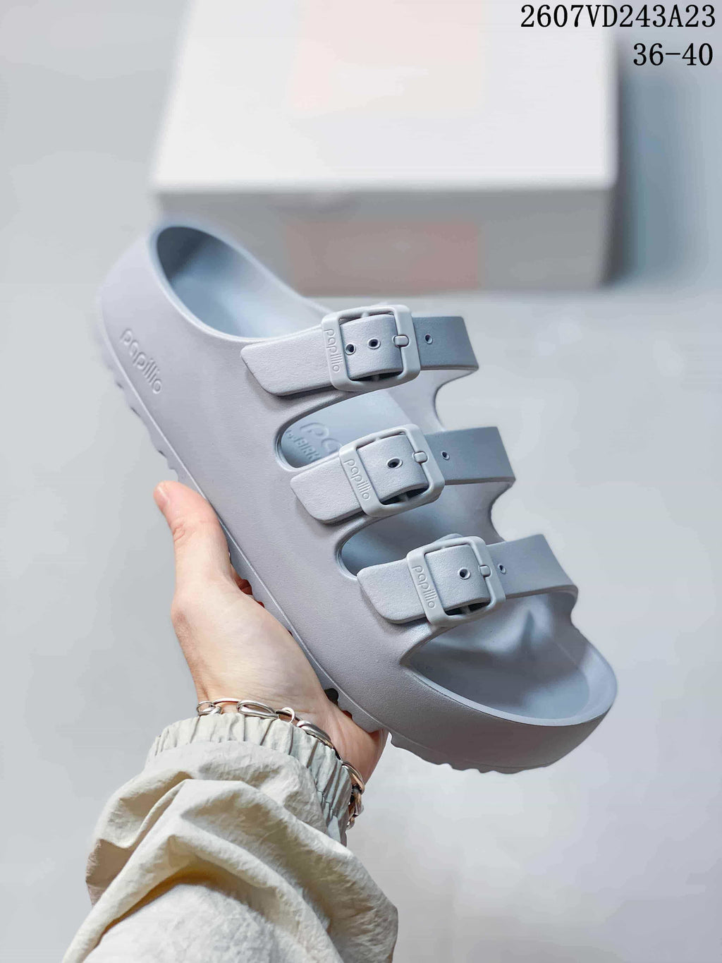 Pale gray Papillio three-strap sandal with adjustable buckles.