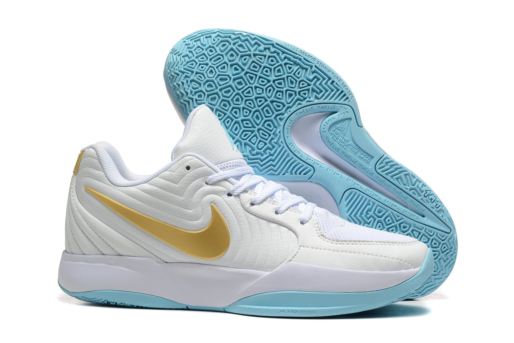 White and blue Nike Ja 2 basketball shoes with gold-colored accents, side and outsole views