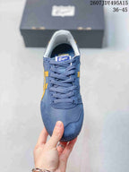Front view of the blue sneaker with yellow accents, woven laces, padded collar, and branded tongue; image text shows size range 36-45.