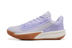 Side view of a lavender Nike Precision 7 basketball shoe with a cream midsole and gum-colored outsole.