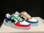 Three-quarter view of both colorful low-top sneakers with white laces and black star-shaped side details.