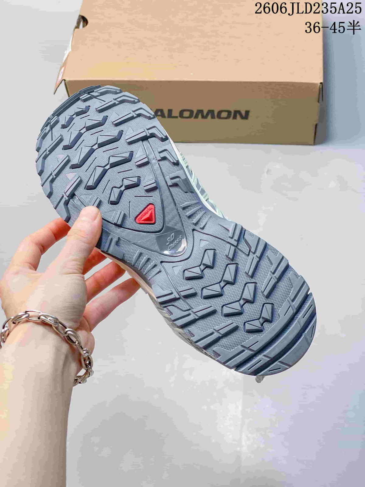 Close-up of the gray lugged outsole and 3D chassis marking