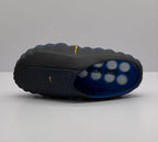 Top and outsole-side view showing the perforated upper and blue footbed.