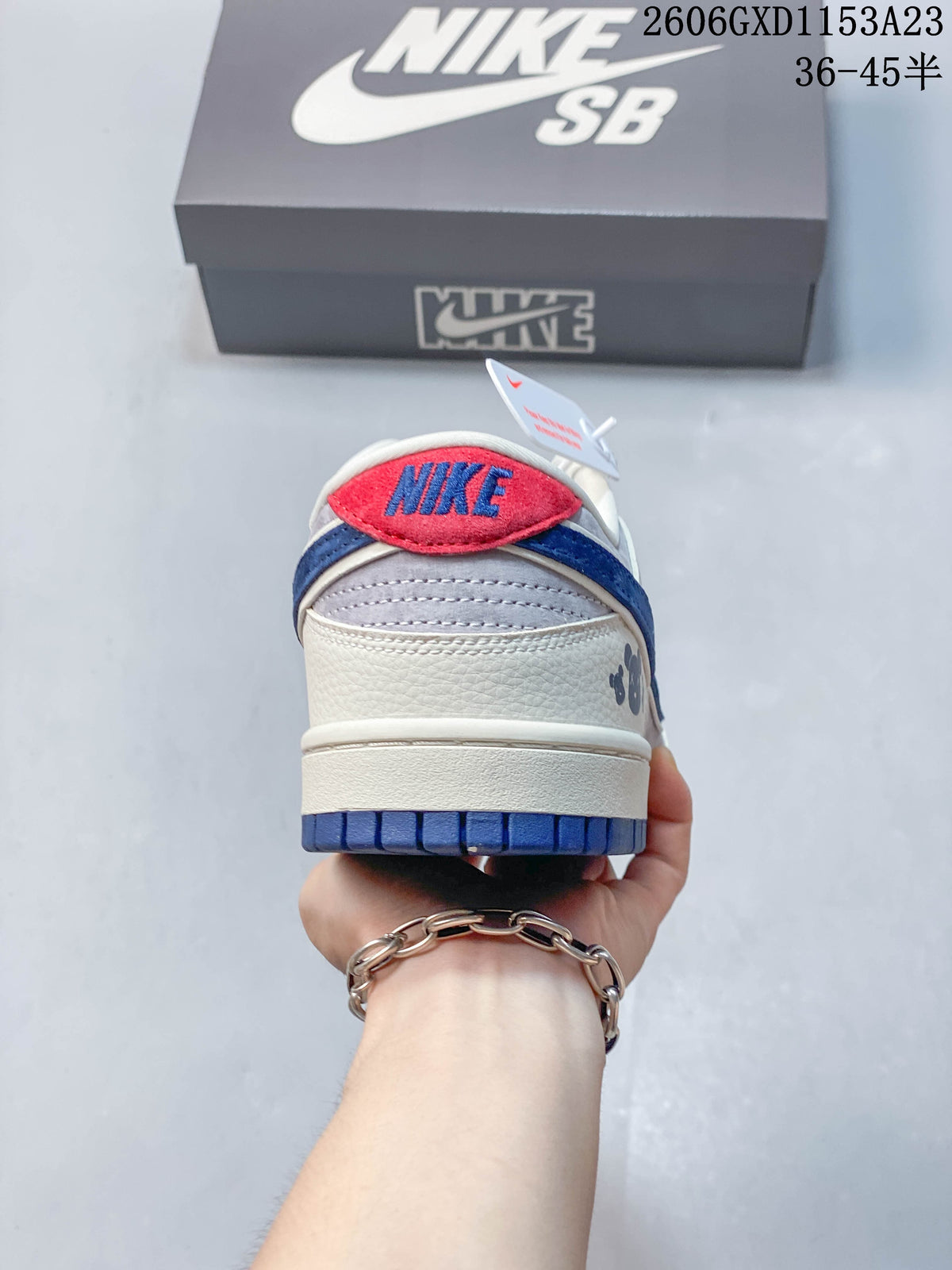 Heel view showing red and blue accents and bear-themed graphics