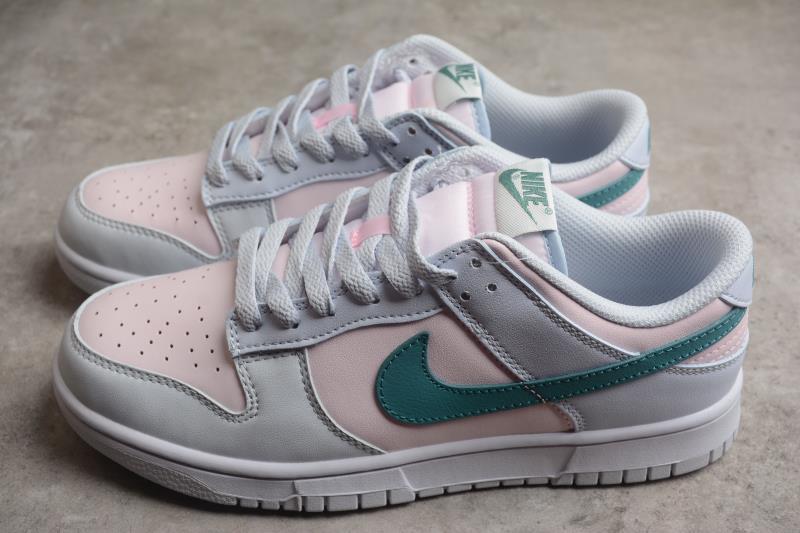 Pair of low-top sneakers shown from above and the side in white, pale pink and green.