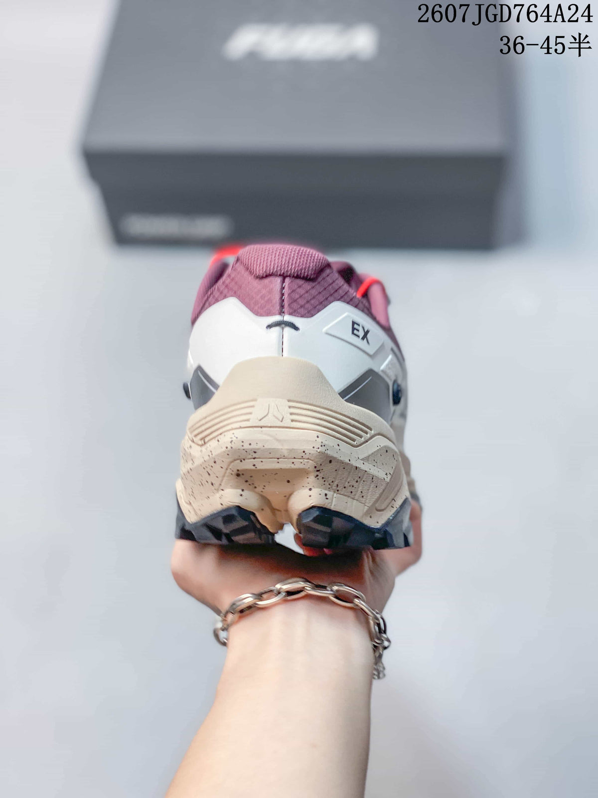 Rear view of the shoe showing the EX3 heel marking, layered heel construction and lugged outsole.