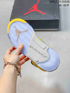 Bottom view of the sneaker showing a translucent outsole and Jordan branding