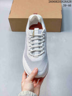 Top view highlighting the laces and knit-style upper.