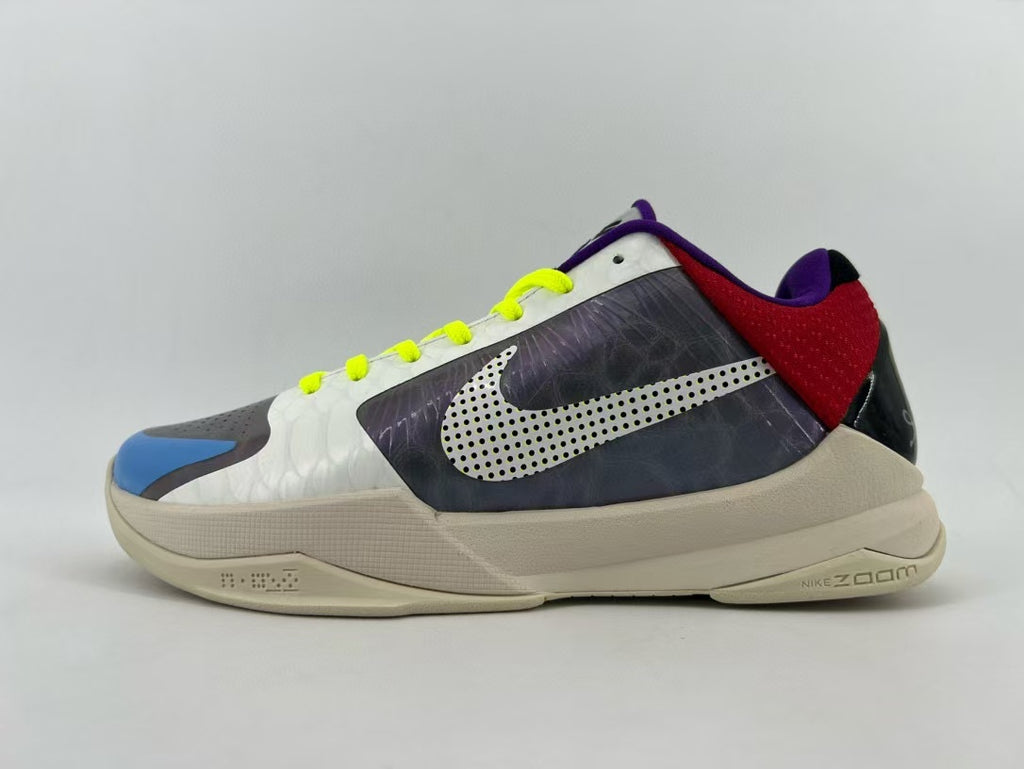 Side profile of the shoe with multicolor panels and beige-colored sole
