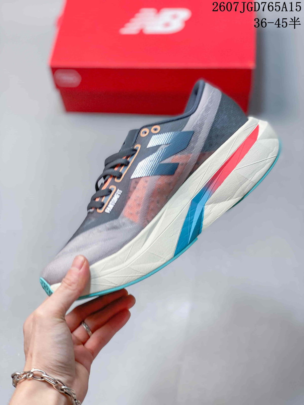 Side profile highlighting the gray upper, layered side branding and multicolor midsole accents.