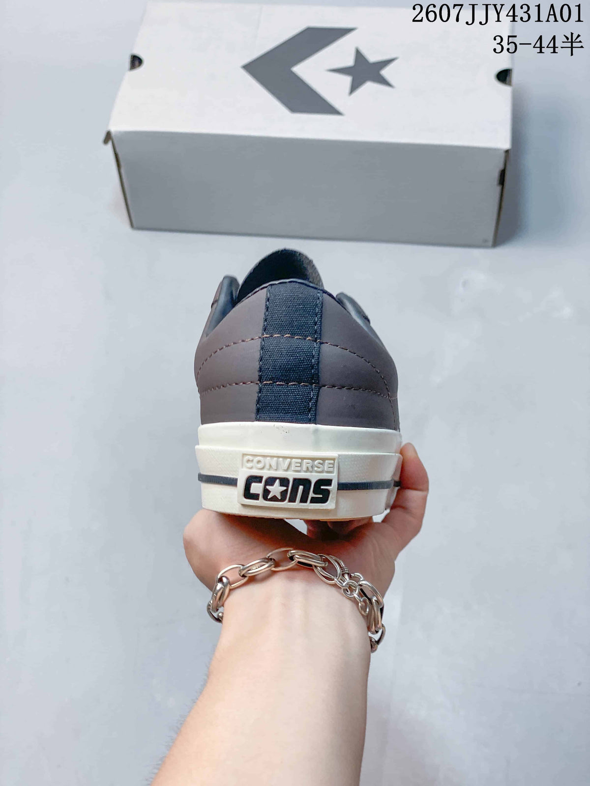 Rear view of the gray sneaker with a branded heel detail