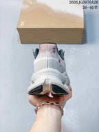 Rear view of the sneaker showing the heel and sculpted sole.