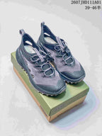 Pair of gray Keen Zionic ADV low-top hiking shoes with cord-toggle lacing