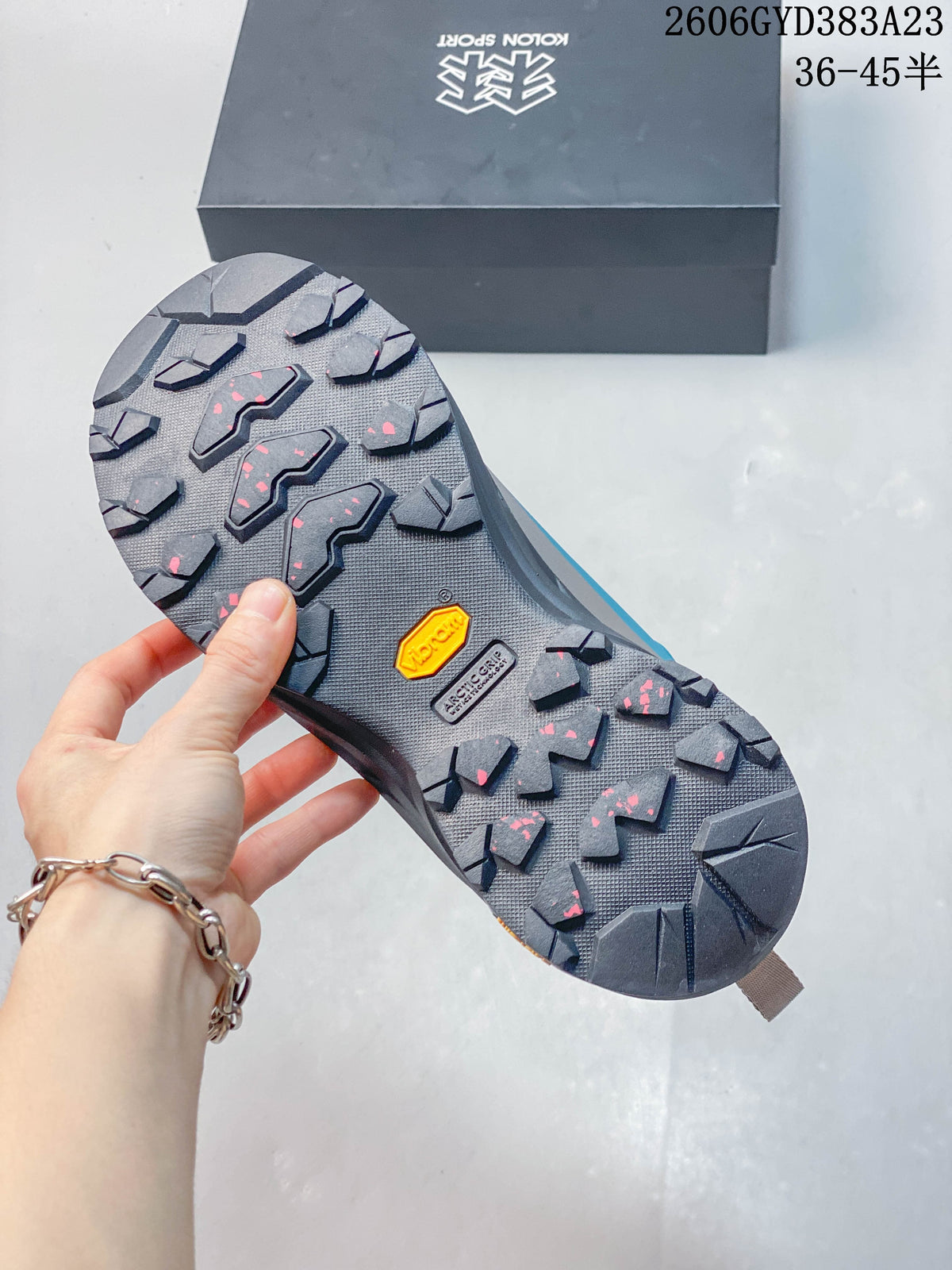 Close-up of the lugged outsole with visible Vibram branding