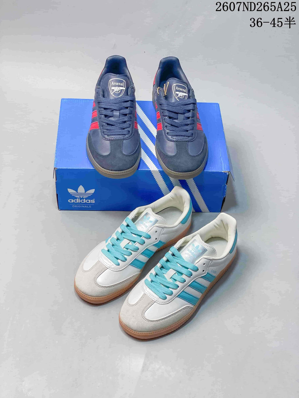Both photographed colorways of the adidas sneakers shown together, with navy/red and white/aqua pairs.