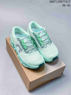 Pair of mint green On Cloudmonster Void sneakers displayed on a shoebox, with the style code and size range visible above.