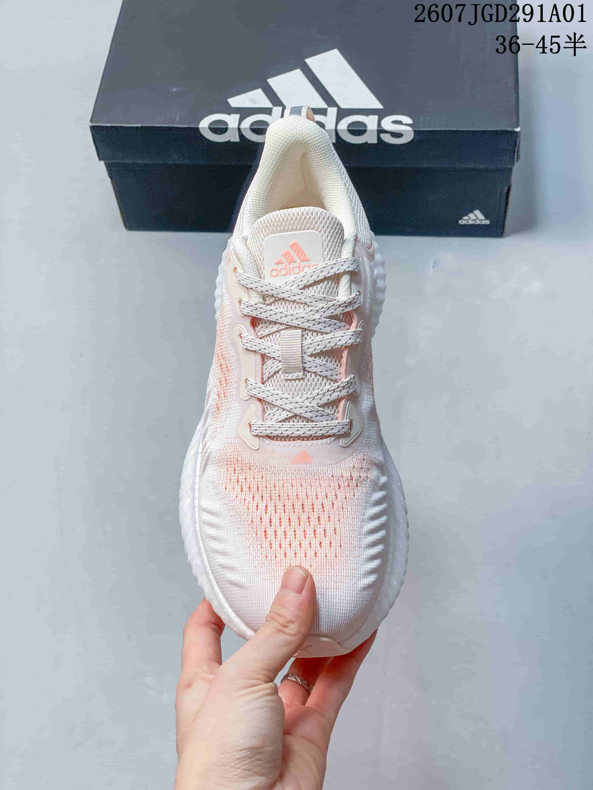 Top view showing the laces, tongue, and pale pink detailing