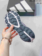 Close-up of the sneaker outsole showing raised tread