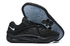 All-black Nike KD 16 shoes with a translucent blue-gray patterned outsole.