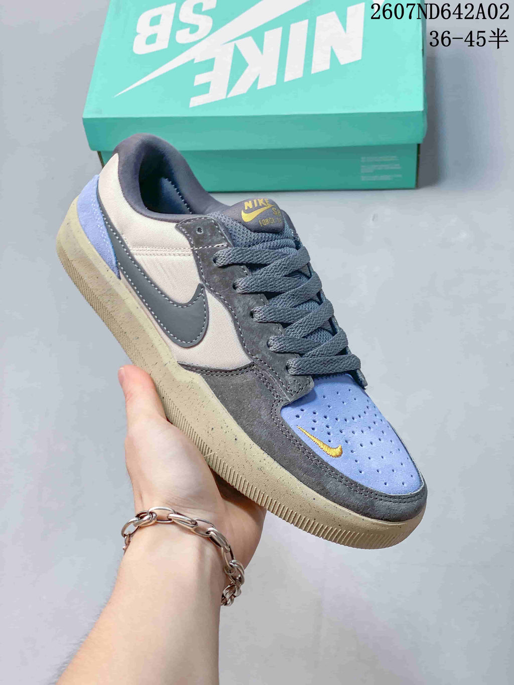 Angled view of a Nike SB Force 58 shoe showing its multicolor panels and low-top shape