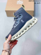 Side view of the navy high-top sneaker showing the extended collar, white On logo, and sculpted white outsole.