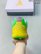 Rear view of the multicolor basketball shoe showing the yellow heel, green upper and dotted detailing.