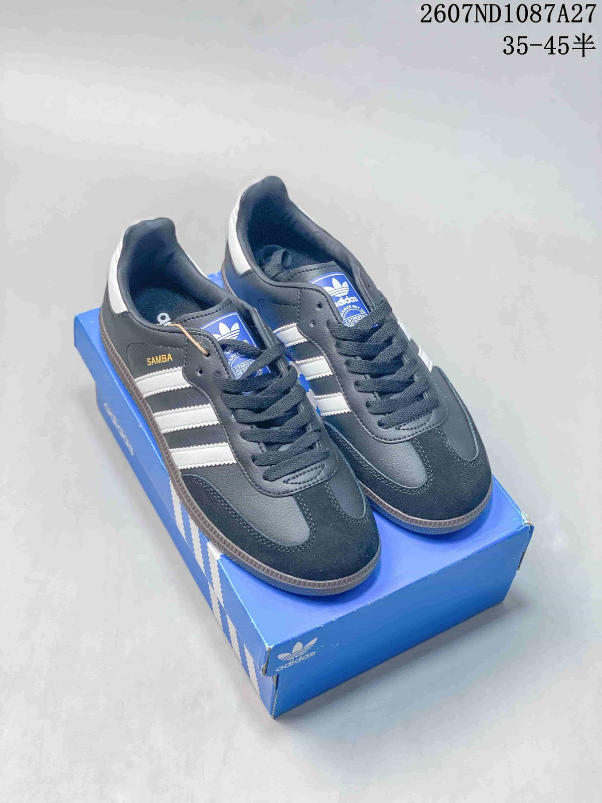 Pair of black and white adidas Samba sneakers displayed on a blue shoebox, with the style code and 35–45 size range visible above.