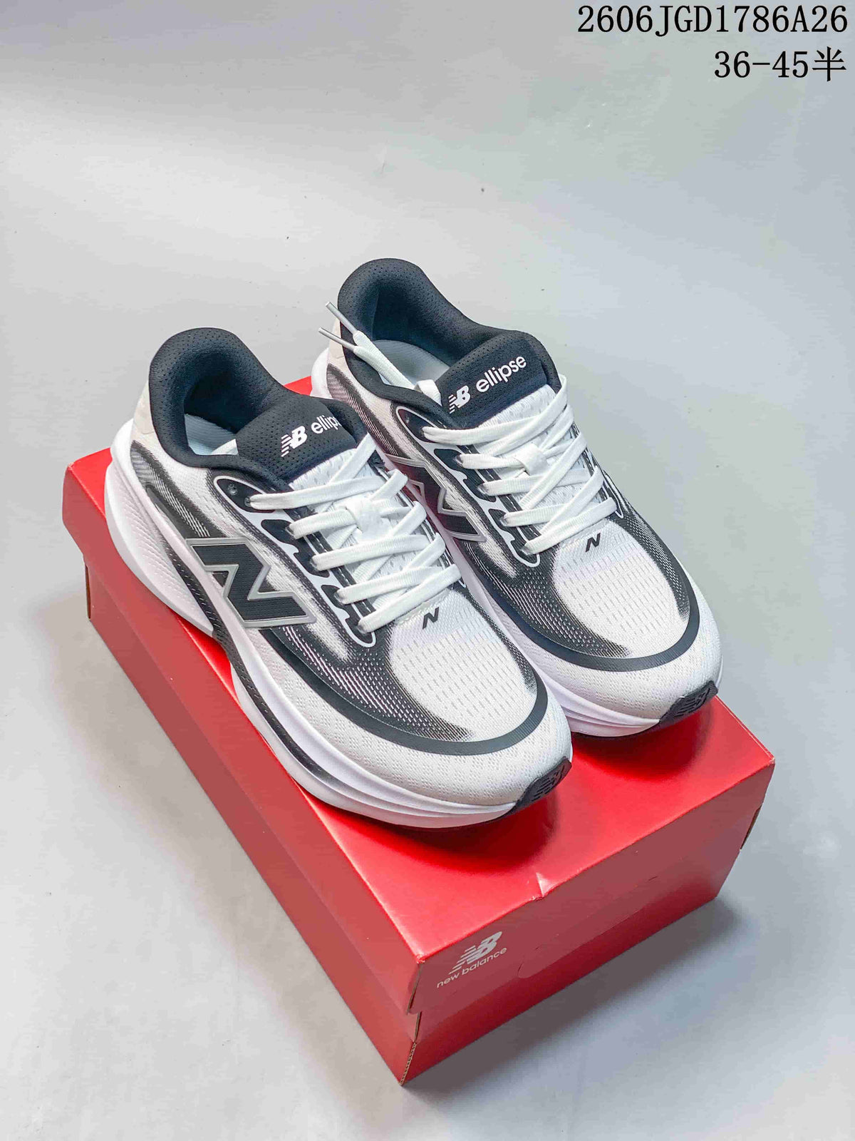 White and dark gray New Balance Ellipse V1 running shoes displayed on a red shoe box