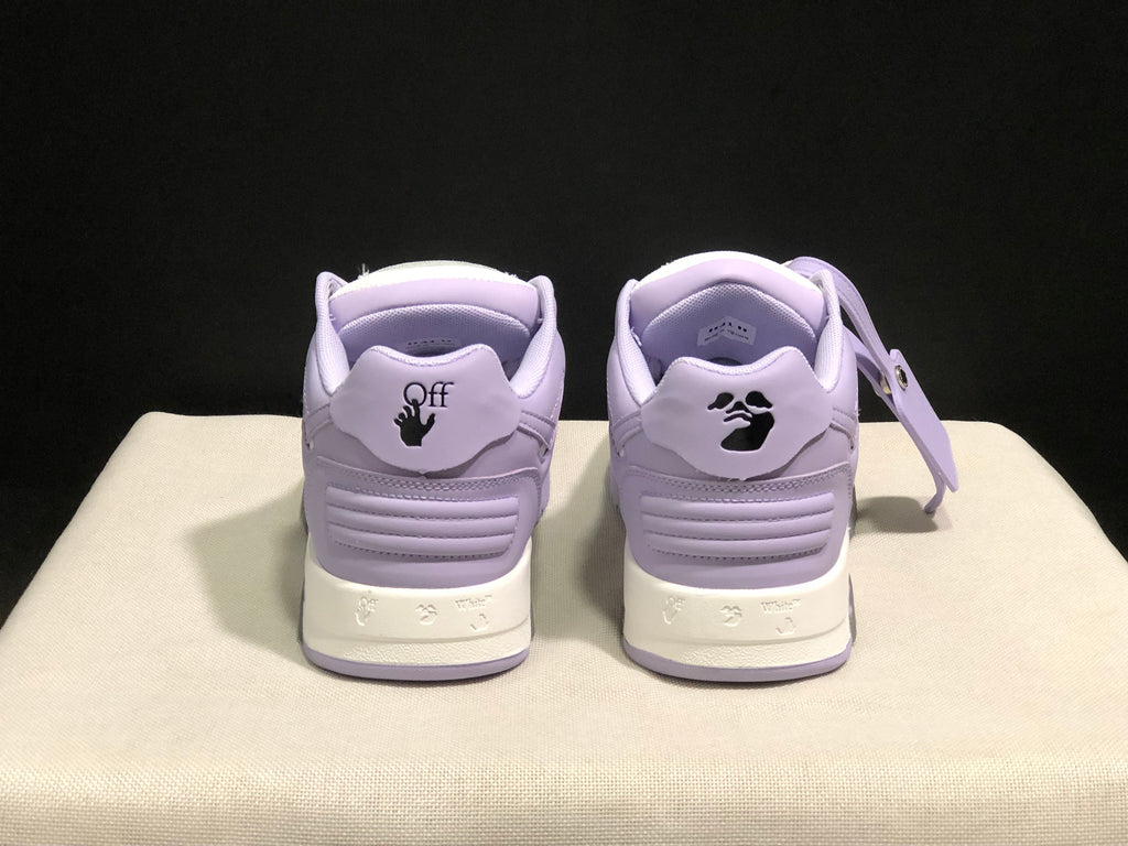 Rear view showing lavender heel panels, padded collars, and graphic heel details.