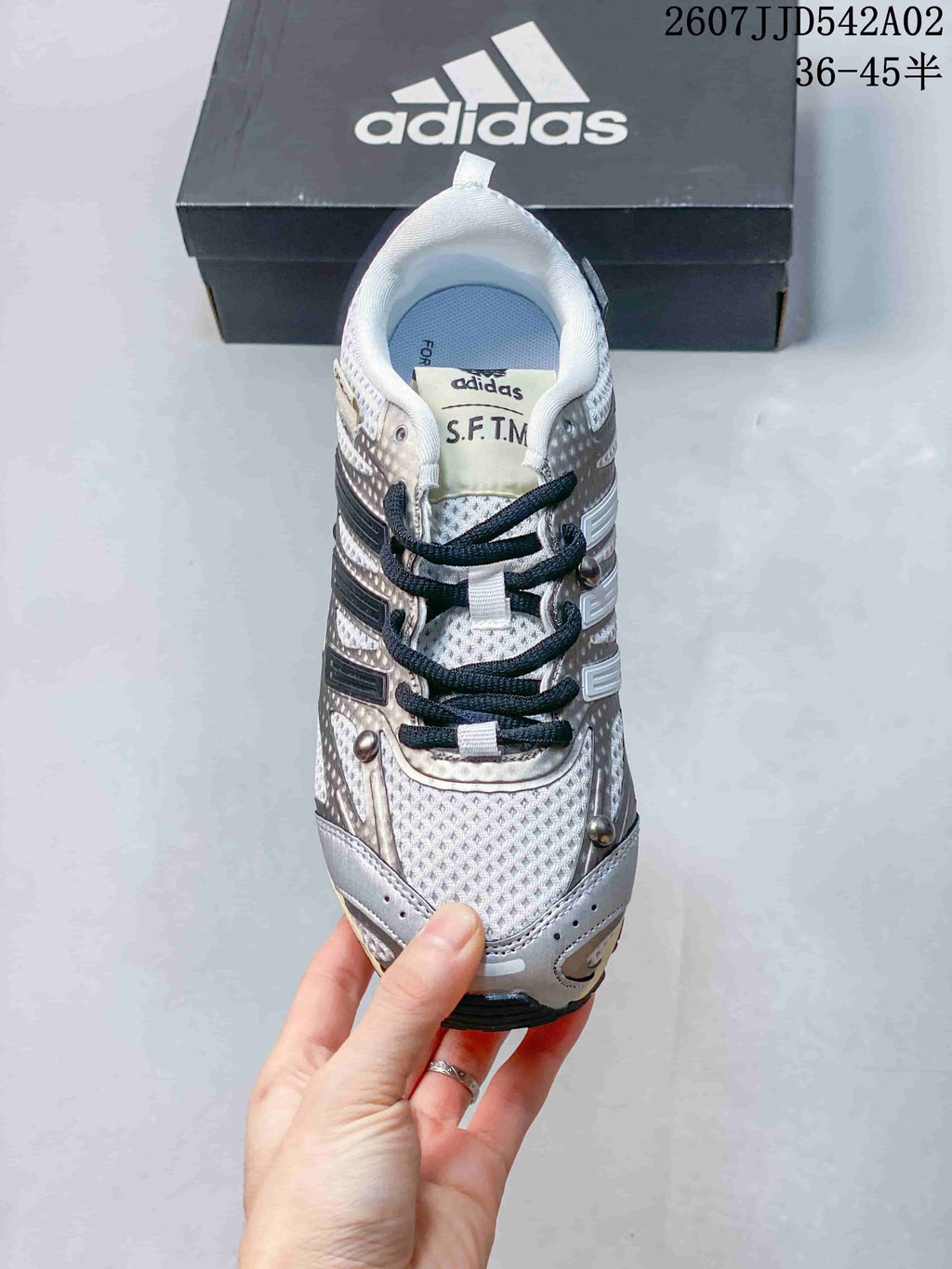 Front view showing the laces, tongue and textured toe area