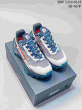 Pair of KAILAS FUGA EX330 trail shoes in blue, gray, white, and orange displayed on an EX330 shoebox; visible text includes style code 2607JLD116A16 and size range 36–45.5.