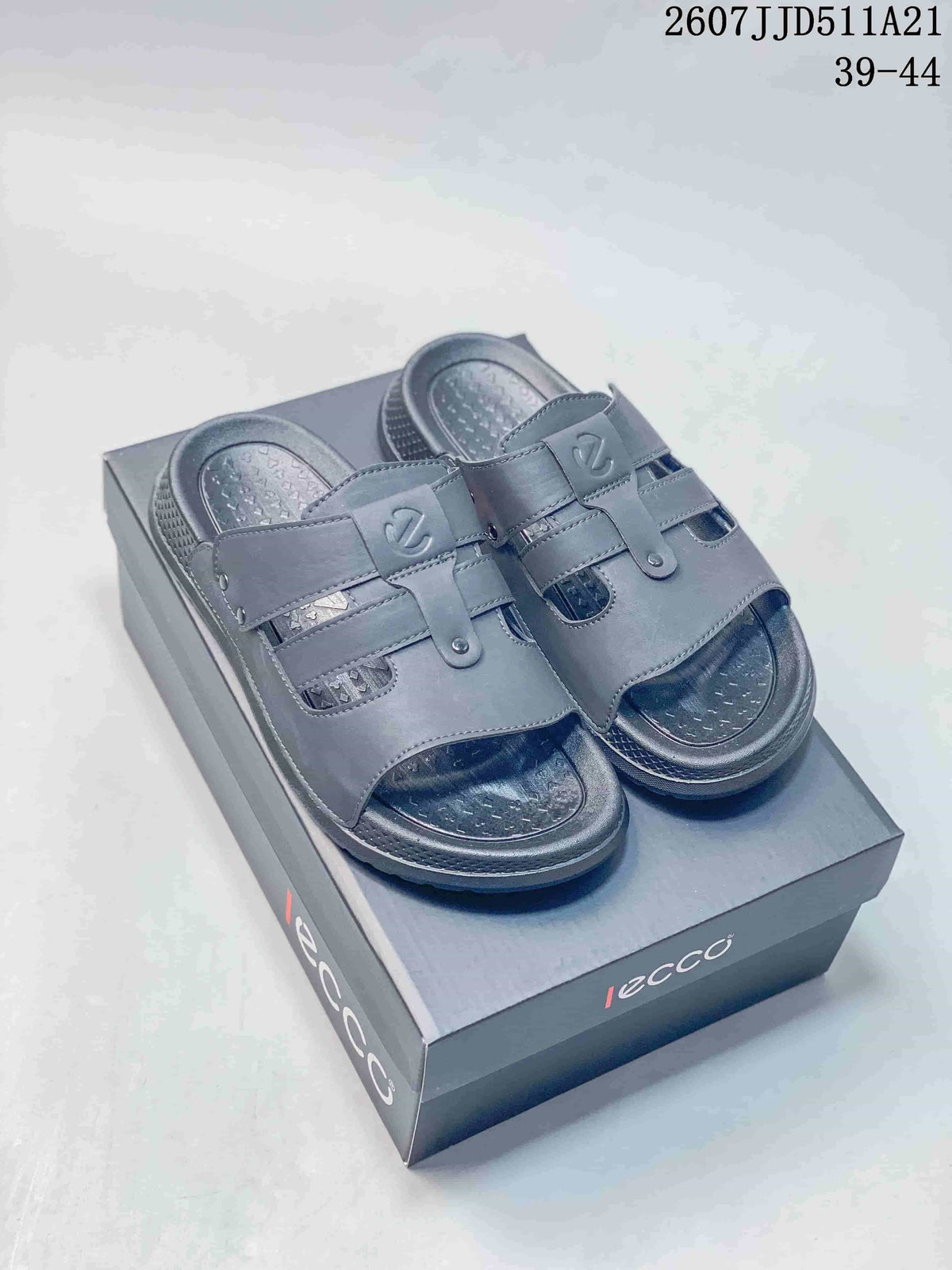 Pair of gray ECCO open-toe sandals displayed on a branded shoebox.