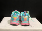 Rear view showing the padded collars, pull tabs and layered heel construction of the sneakers.