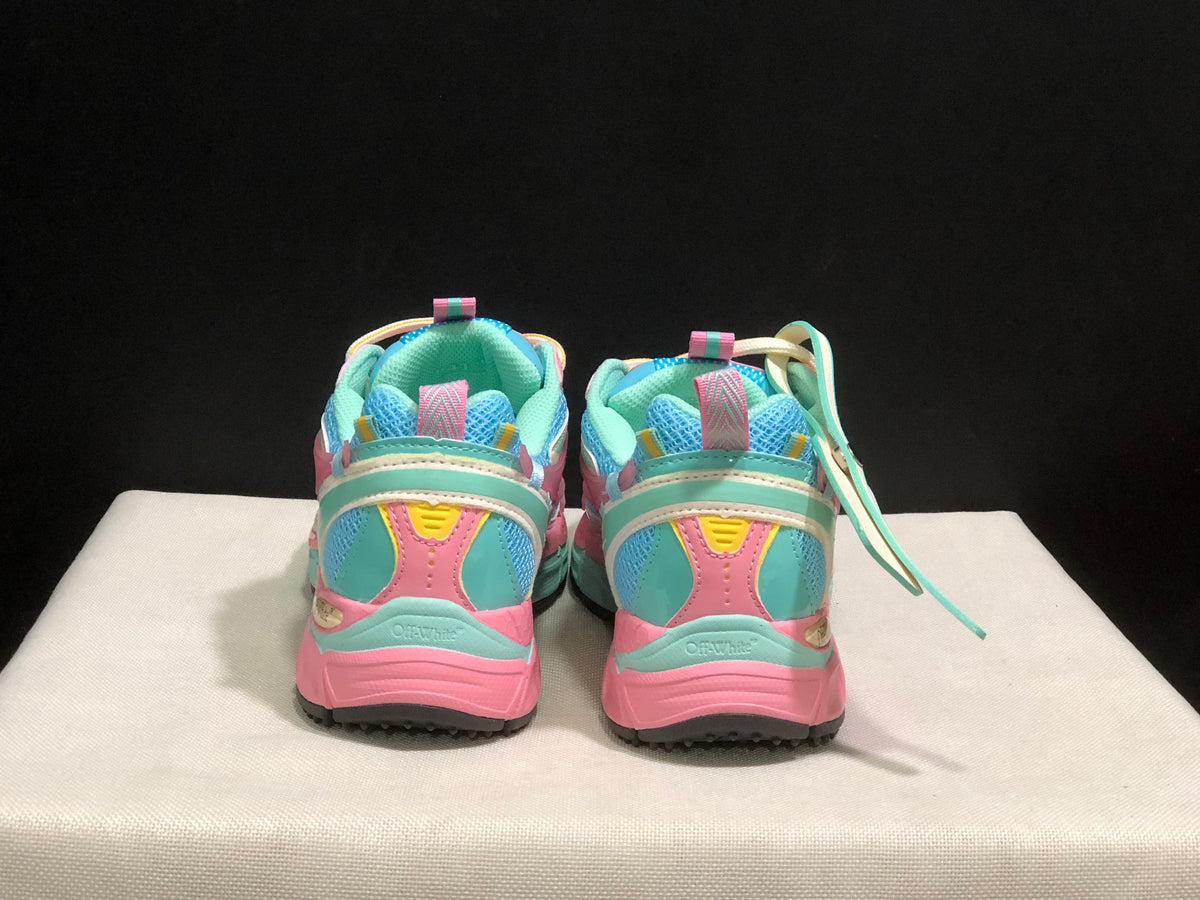 Rear view showing the padded collars, pull tabs and layered heel construction of the sneakers.