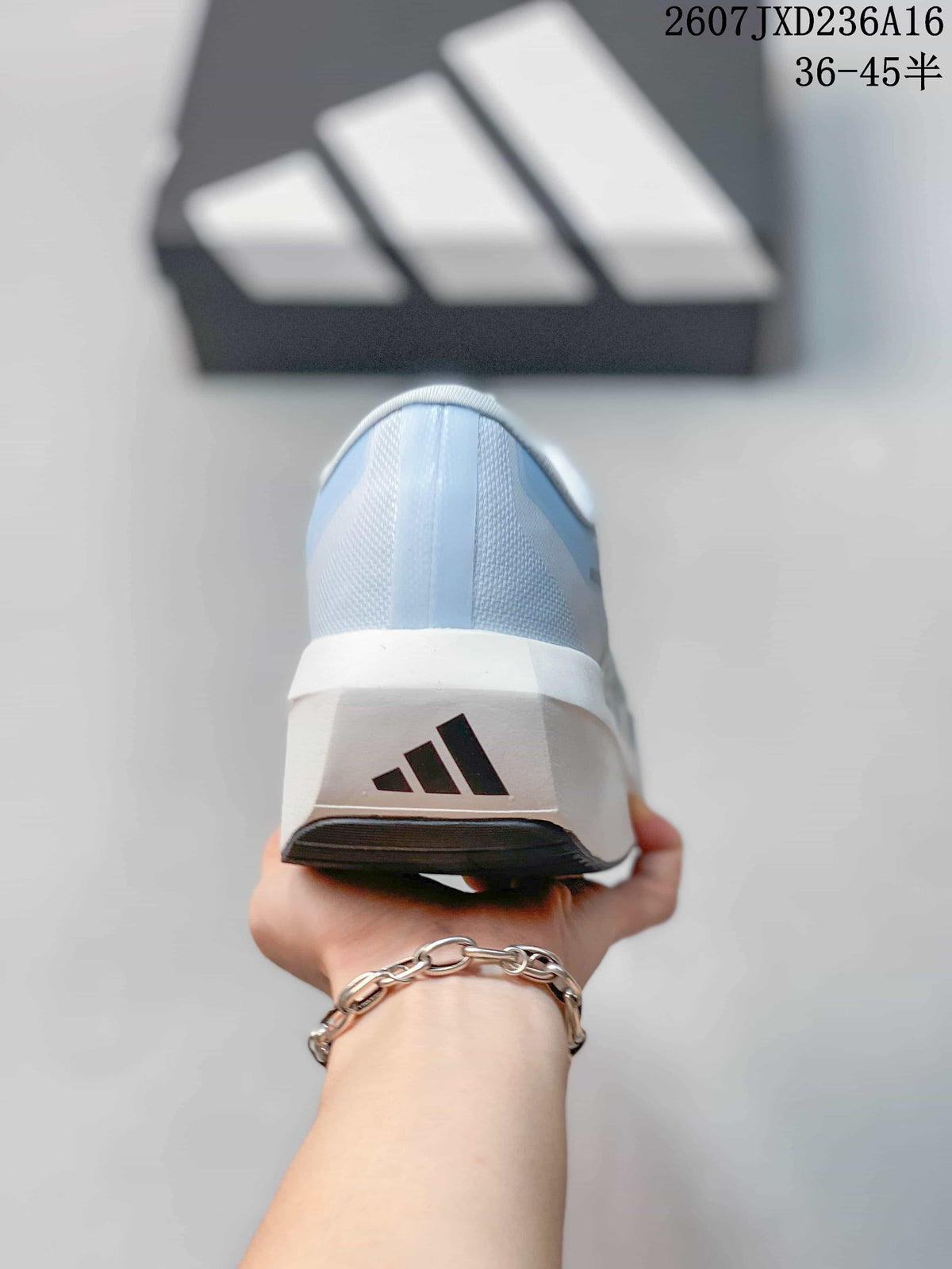 Rear view of the shoe showing the light blue heel, white midsole and adidas logo detail.