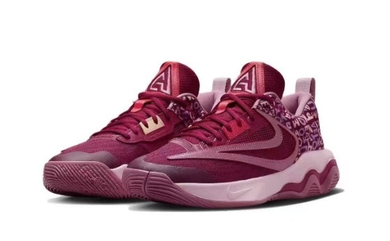 Burgundy Nike Giannis basketball shoes with a pale midsole