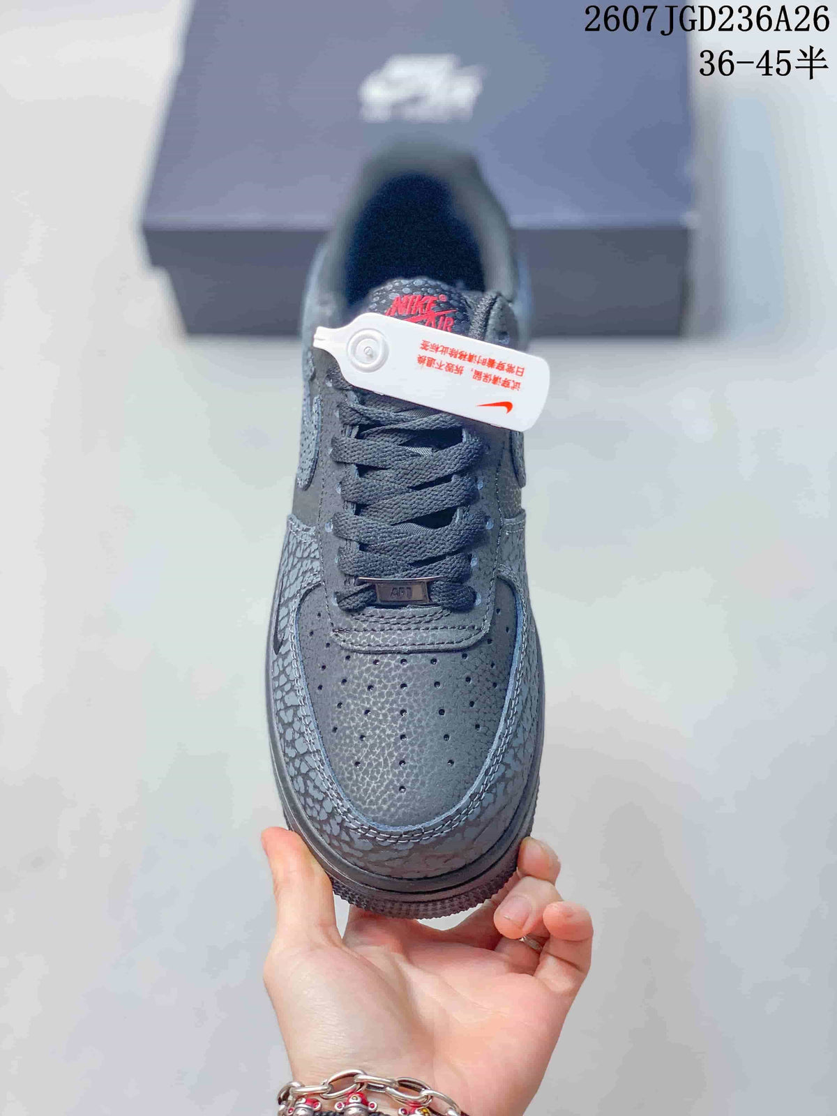 Top view showing the perforated toe box, dark laces, tongue branding, and patterned toe overlays.