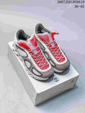Pair of white, gray, and red On Cloud X sneakers displayed on a shoe box.