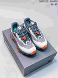 Pair of KAILAS FUGA trail running shoes in gray, white, black, and orange displayed on a shoebox; style code 2607GJD1548A18 and size range 36–45 are visible.