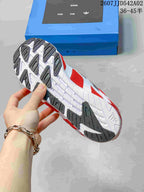 View of the adidas Adizero sneaker outsole with dark tread sections