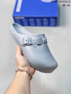 Light blue closed-toe buckle sandal shown from a closer side angle.