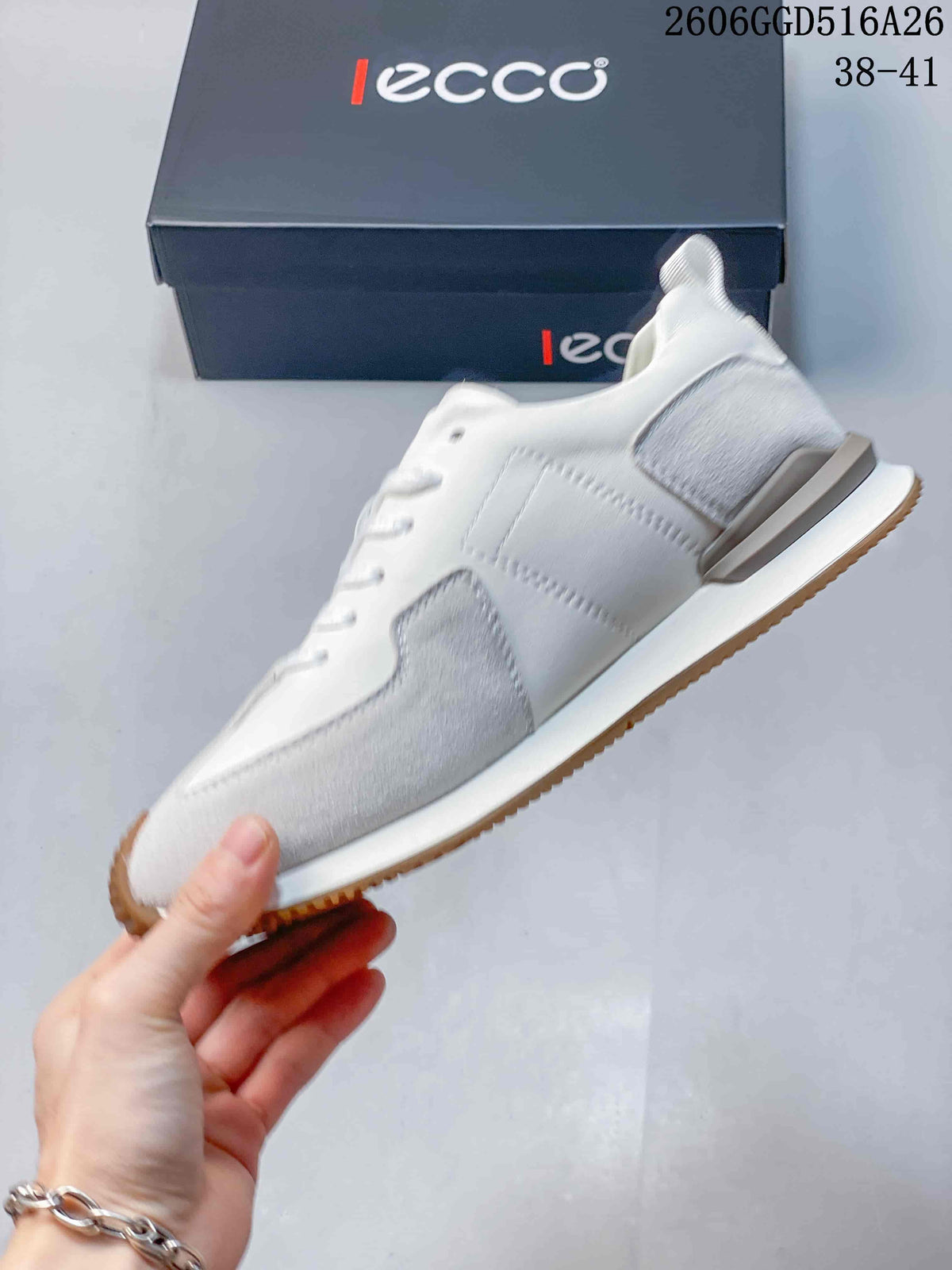 Side view of the white and gray low-top sneaker