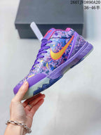 Side view of the purple low-top basketball shoe showing the multicolor upper, yellow-orange Swoosh and layered sole.