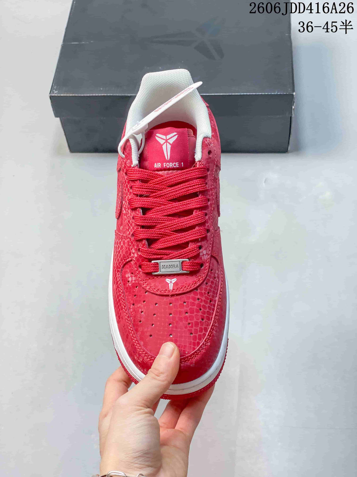 Top view of red laces and tongue graphics on a patterned sneaker