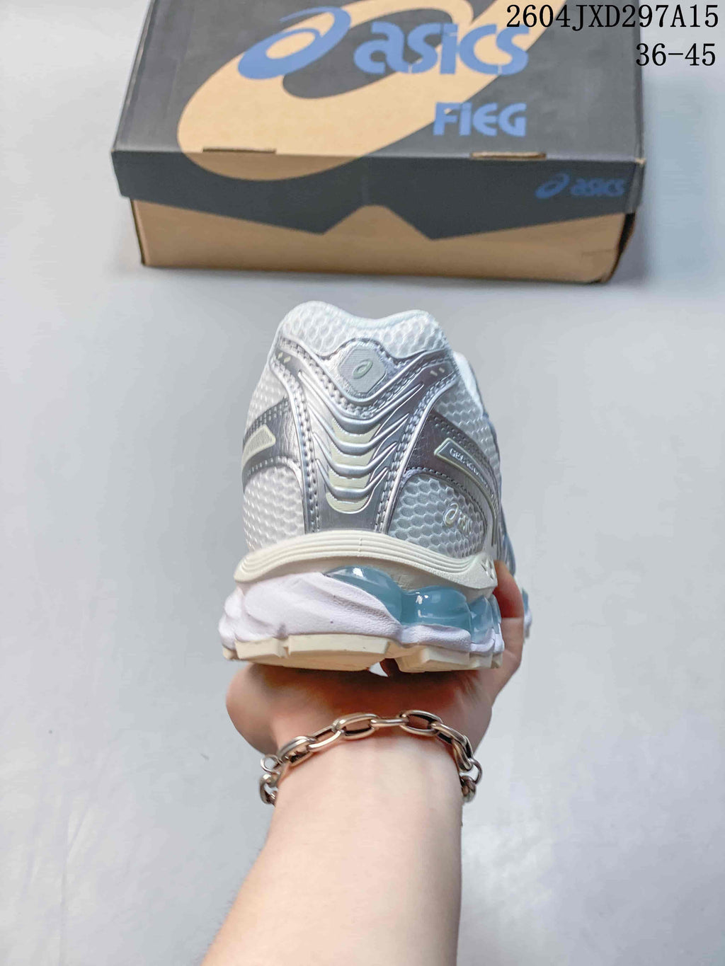 Rear view of the sneaker with layered heel details and sculpted sole