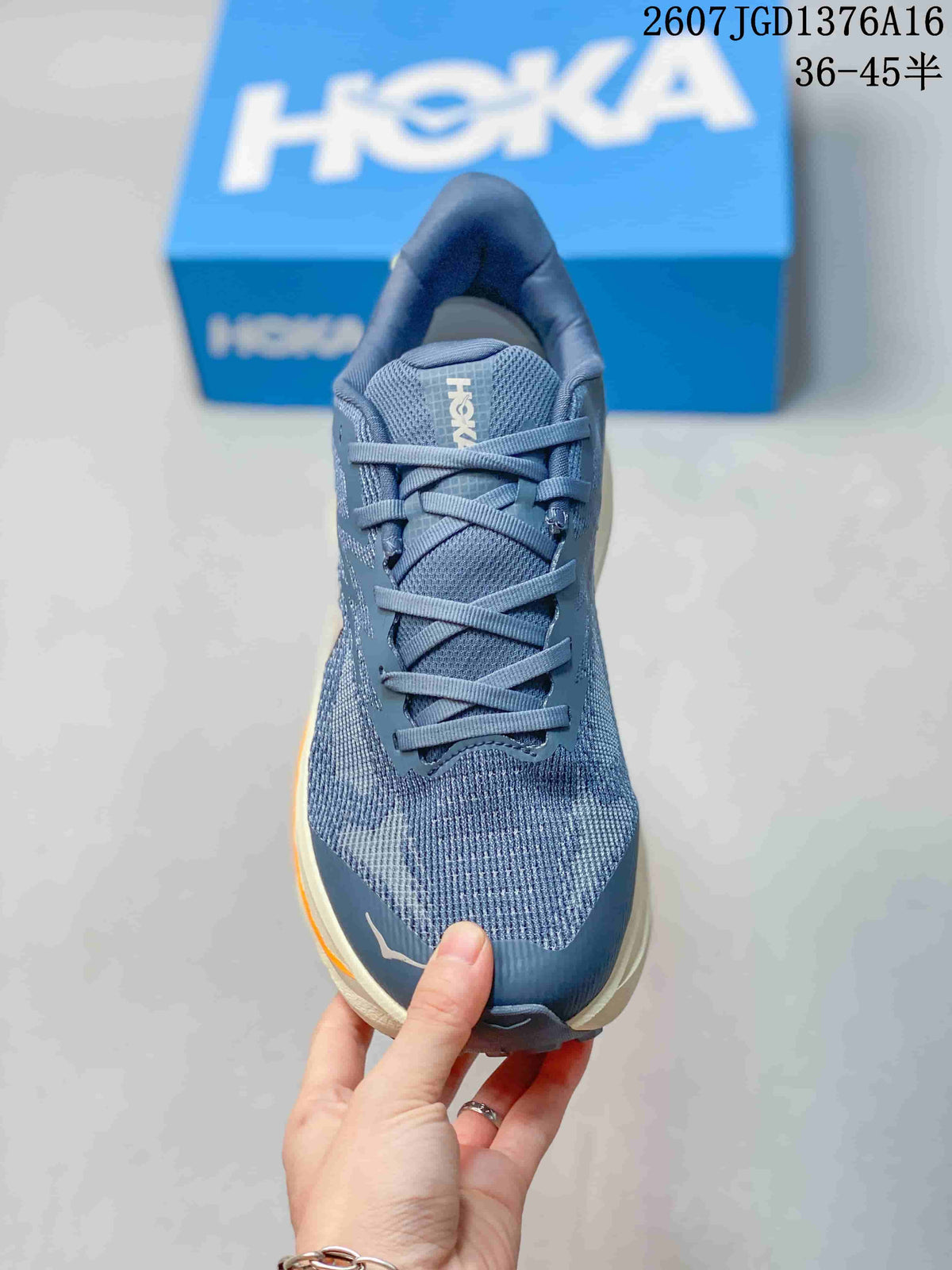 Top view of the blue shoe showing the mesh-like upper, tongue and lace arrangement.